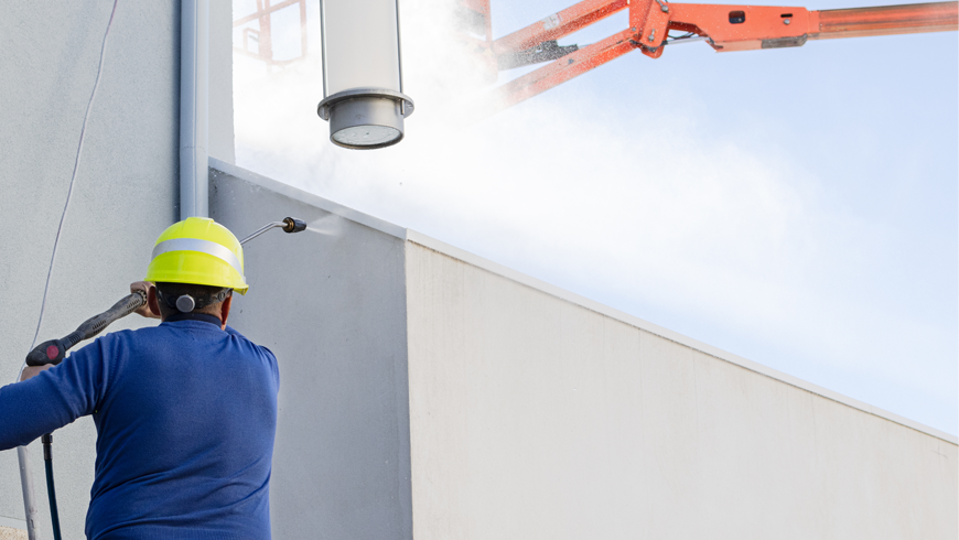 power washing the exterior of a commercial building